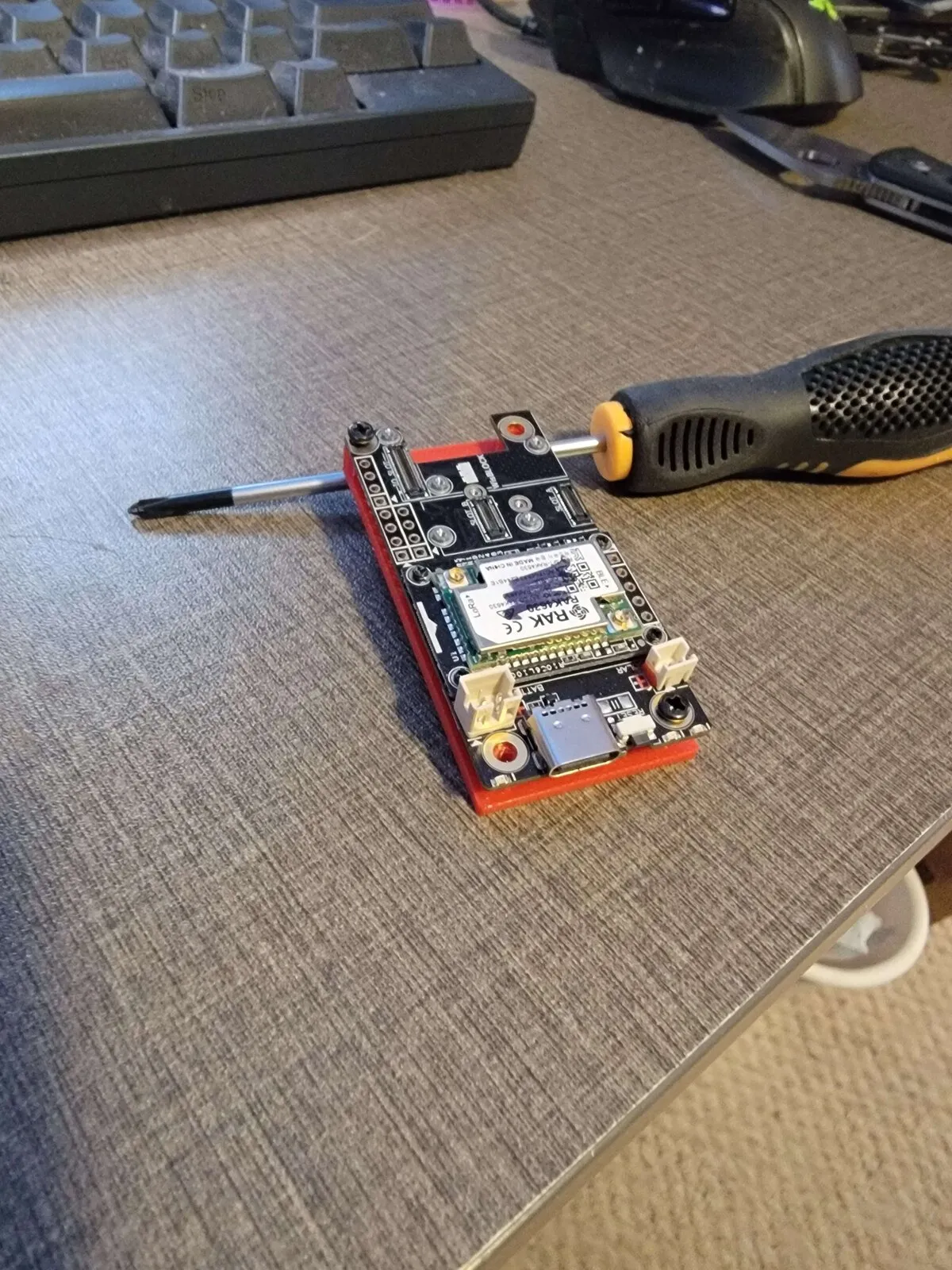 RAK board mounted on the red PETG plate